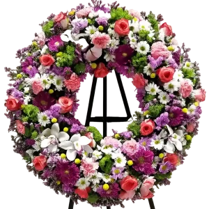 Corona floral colorida para funeral en Pamplona – rosas, orquídeas y crisantemos